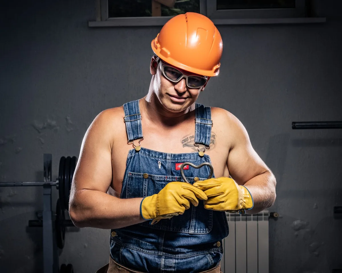 plumber using toilet auger